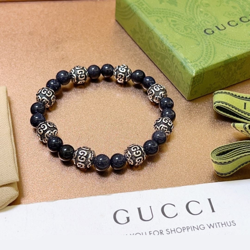 G*u*i bracelets